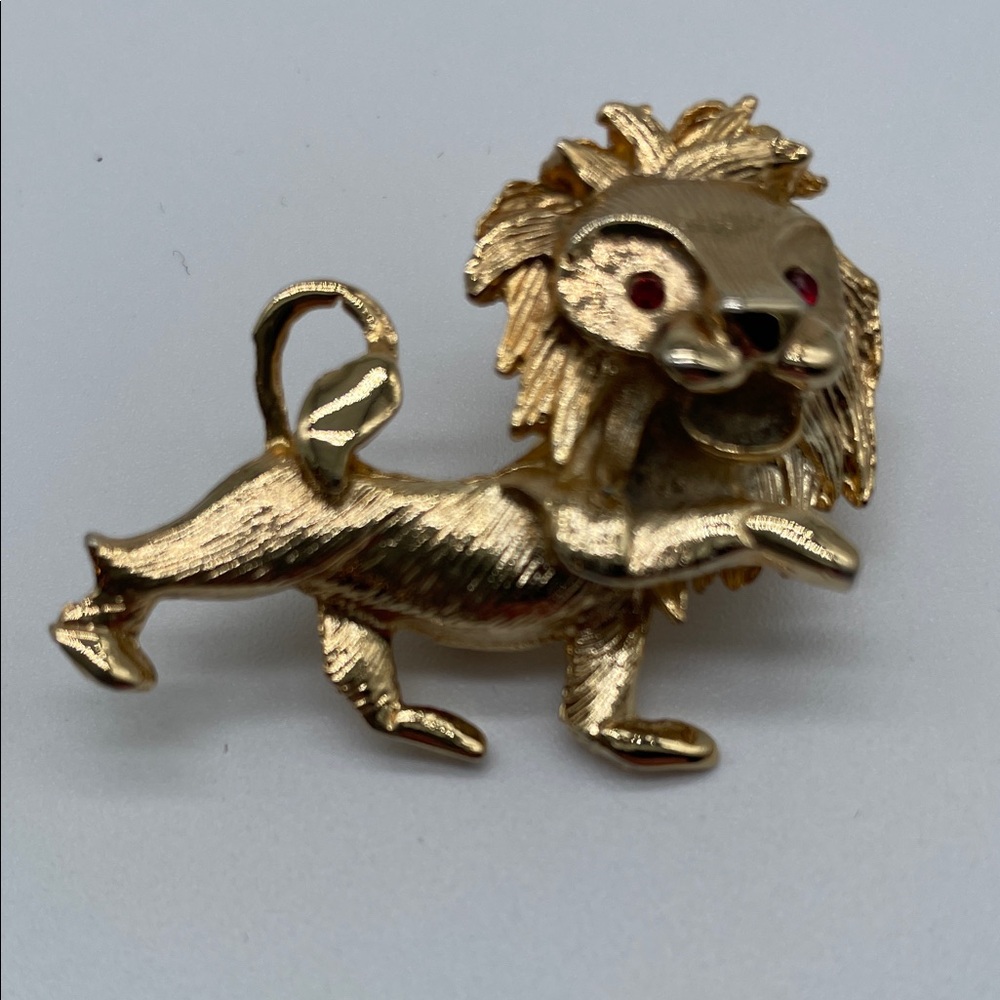 Gold Tone Lion Brooch with Red Accents